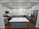 7741 S Bennett, Chicago, IL 60649