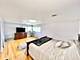 7766 W Higgins Unit E, Chicago, IL 60631