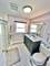 7766 W Higgins Unit E, Chicago, IL 60631